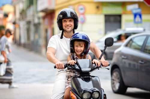 Father and daughter on the motorcycle