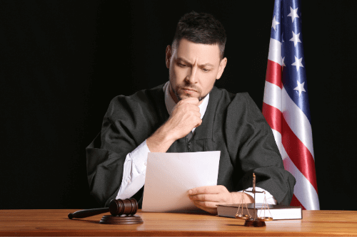 Male Judge Reading Documents